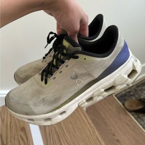 On Running Gray and Blue Sneakers with Cushioned Sole